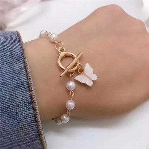 Bracelet Papillon Perles Élégantes - 2 couleurs au choix !