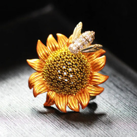 Broche tournesol flamboyant et abeille dorée