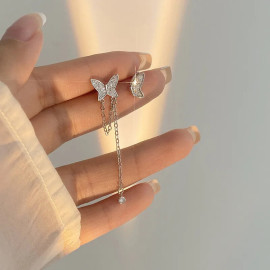 Boucles d'oreilles papillon en argent avec demi-aile